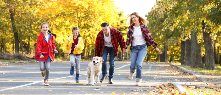 Family insured by Barlow Insurance Agency enjoying Fall weather