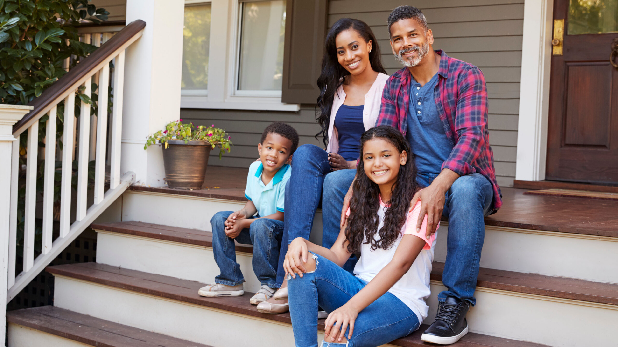 Family On Porch Insured by Barlow Insurance Agency